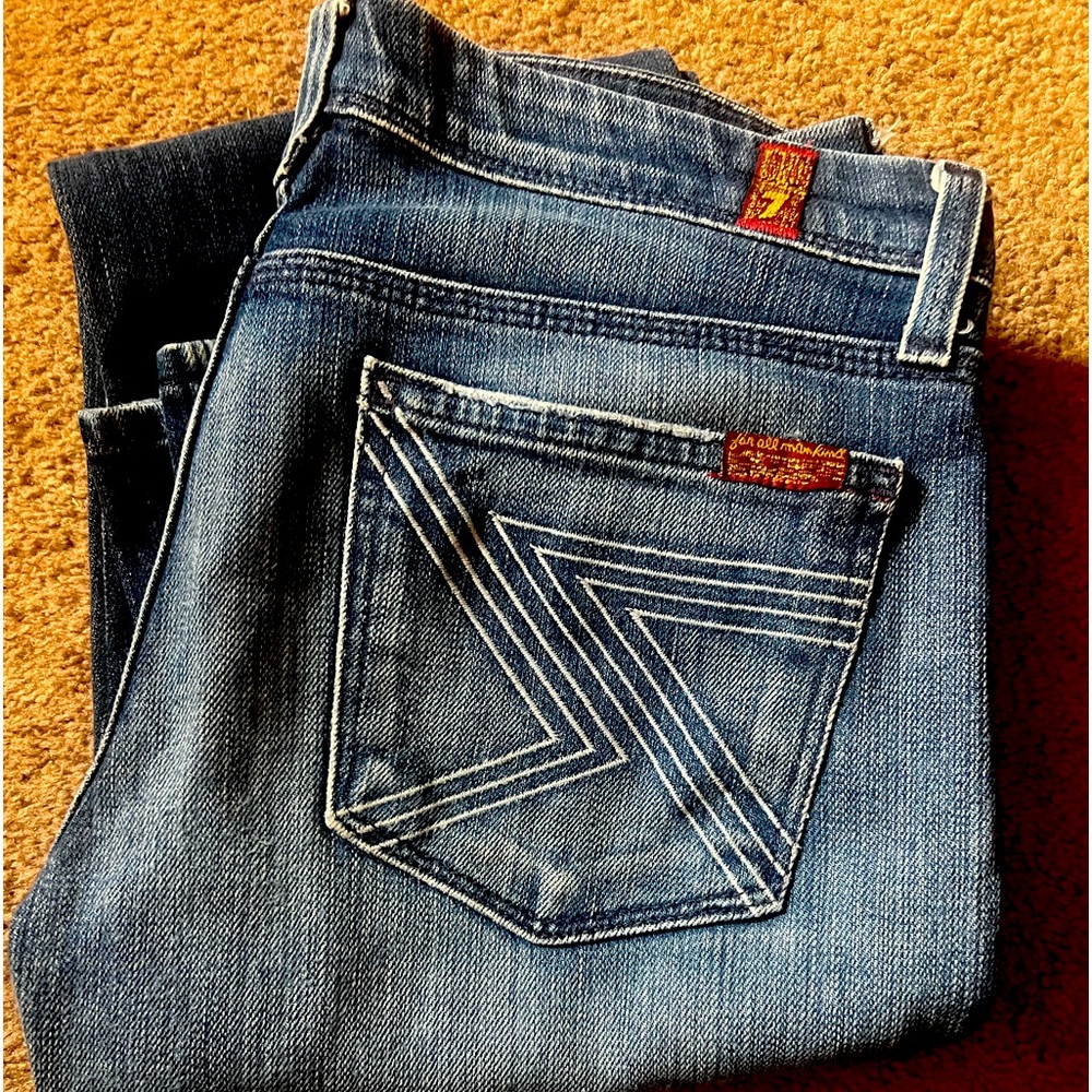 7 for all mankind! These jeans are so cute!! They are size 28 and perfect!